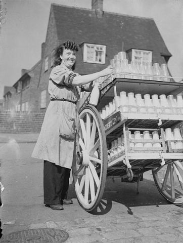 Women_Deliver_the_Milk_in_Wartime,_Leeds,_England,_C_1942_D8760